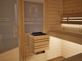 Saunaofen mit Steinen in der Sauna Athen 2 kleine Fenster Massivholz Zirbe