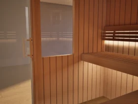 Innenraum der Sauna Athen 2 kleine Fenster Profilholz Erle mit freiem Ofenplatz