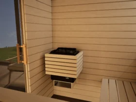Saunaofen mit Steinen in der Sauna Venus Glastür Profilholz Linde