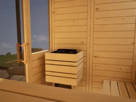 Saunaofen mit Steinen in der Sauna Venus 2 Fenster Massivholz Zirbe