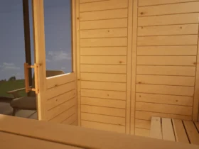 Innenraum der Sauna Venus 2 Fenster Massivholz Zirbe mit freiem Ofenplatz